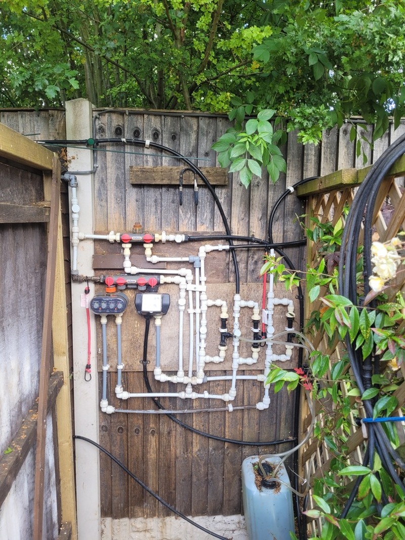 Other image for Barnsley’s Best Garden competition: Mick works his magic to water his ‘zen’ garden